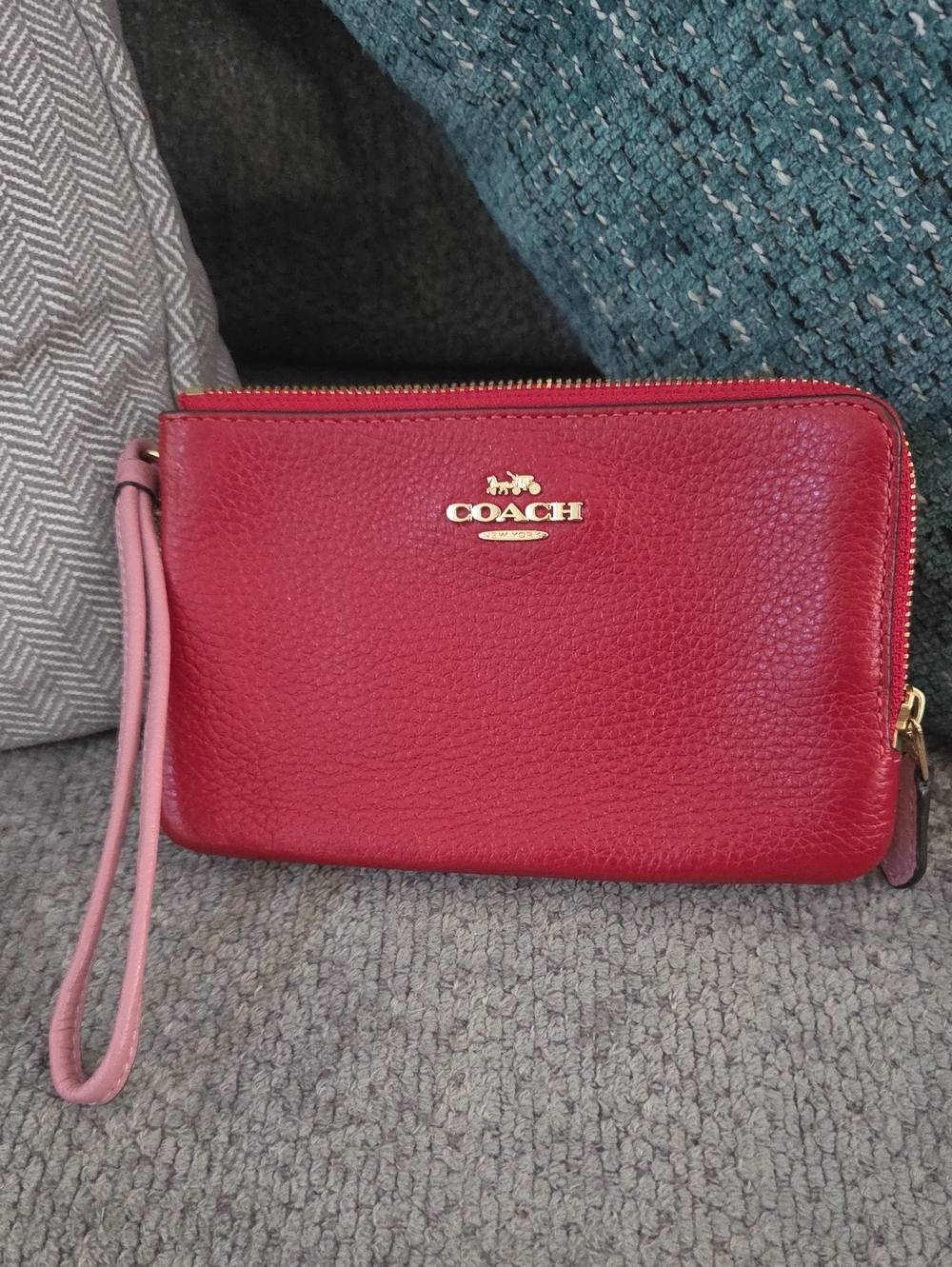 COACH Red Pebbled Leather Wristlet with Pink Strap